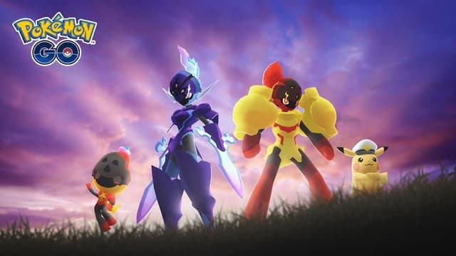 Charcadet, Ceruledge, Armarouge, and Pikachu in Cap's hat pose on the grass.