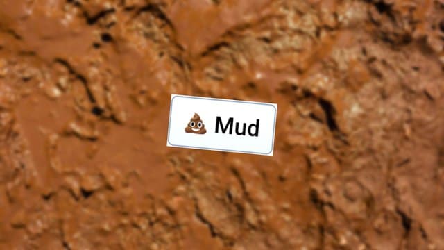 Infinite Craft Mud block atop a blurred brown backdrop image of wet muddy dirt